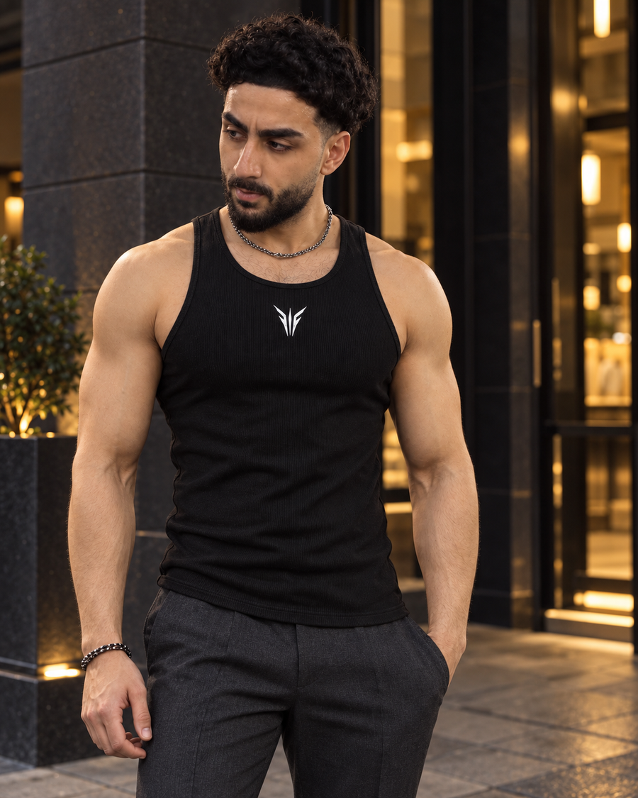 AI-assisted SCULPT 01 evening campaign styled with charcoal trousers
